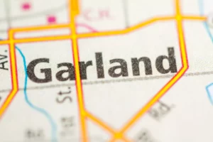 Close-Up Of A Colorful Map Highlighting Garland, Texas, Where A Garland Personal Injury Lawyer Can Provide Legal Representation For Accident Victims.